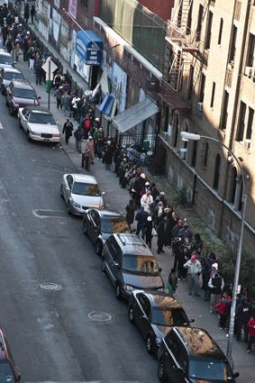 Voters queue to vote in the Flatbush district of Brooklyn, New York. Voters in some areas had to wait four hours to cast their ballot.
