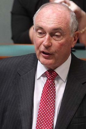 Warren Truss says axing the carbon tax will lower the cost of producing cars in Australia.
