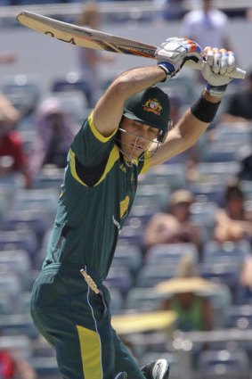 Glenn Maxwell watches his bails fly off.