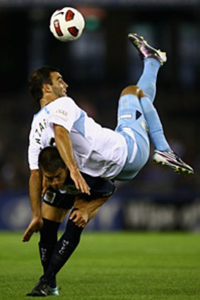 Bruno Cazarine clears in spectacular style last night, but Sydney FC crash-landed.