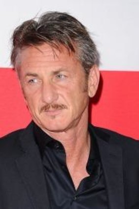 With her partner, Sean Penn in March.