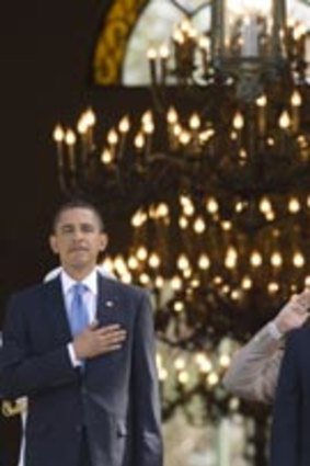 Presidential surrounds ... Barack Obama and Hosni Mubarak at an arrival ceremony at Cairo's Quba Palace.