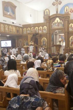 All ye faithful ... Copts celebrate Christmas Eve at St Mary's and St Minda's Coptic Orthodox Cathedral in Bexley on Friday night.