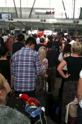 JetStar passengers face lengthy queues at Sydney Airport.