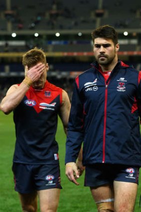 Dejected: Colin Sylvia and Chris Dawes after losing to Collingwood.