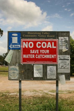 Protest: A sign on the Wyong River, near the site.