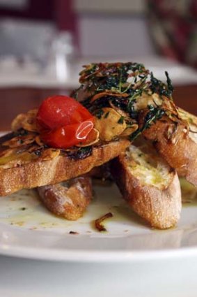 Chargrilled bread with crispy garlic, Maldon salt, thyme and extra virgin olive oil.