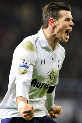 Late winnner ... Gareth Bale after scoring his team's third goal against West Ham.