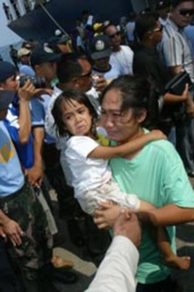 Survivors arrive in Zamboanga after their rescue.