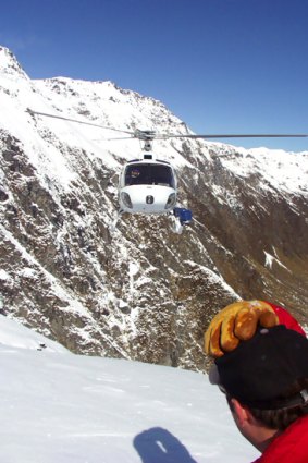 Adrenalin rush ... helicopters take skiers and boarders to another world, deep within New Zealand's impressive Southern Alps, for fresh turns far from the crowds.