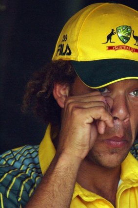 Andrew Symonds looks out from the Pavillion during the game against Bangladesh after being dropped from the team.