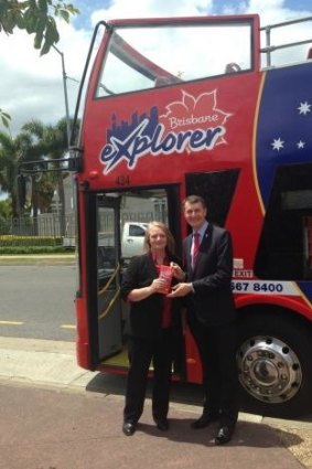 Pamela Staines from City Sightseeing, along with Lord Mayor Graham Quirk.
