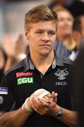 Injured Jordan De Goey: A spectator at the MCG.