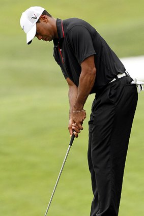 Tiger Woods and his traditional putting stroke - the long-time world No. 1 wants to ensure putters have to be the shortest club in a player's bag.