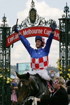 Glen Boss after winning the 2005 Melbourne Cup on Makybe Diva.