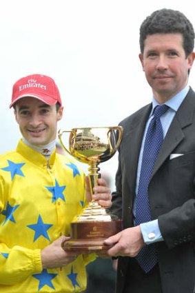 Christophe Lemaire and Mikel Delzangles with the Melbourne Cup in 2011.
