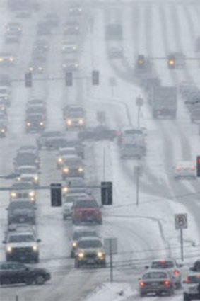 Big chill...motorists battle blizzard conditions in Omaha, Nebraska, on Christmas Eve.
