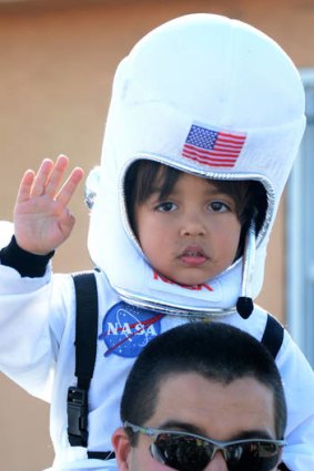 Four-year-old Levi, part of the crowd that thronged the streets to farewell Endeavour on its last journey.