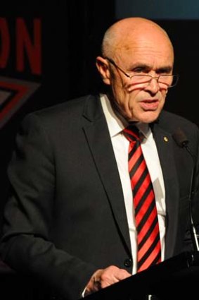 Essendon chairman Paul Little addresses the annual meeting on Monday.