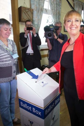 Tasmanian Premier Lara Giddings voting at the St Aidan's Church Hall polling place in the Hobart suburb of Lindisfarne.