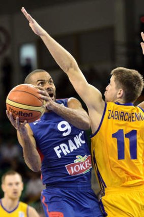 A taste of France: Tony Parker (L) of France vies with Dmytro Zabirchenko of Ukraine during a European Basketball Championships match between Ukraine and France in Ljubljana.