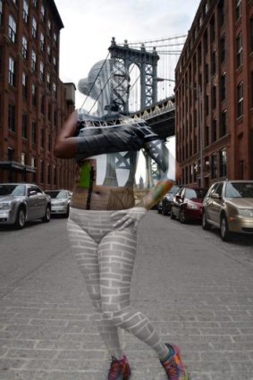 Jessica Mellow poses in front of the Manhattan Bridge after Trina Merry camouflaged her to blend into the bridge.