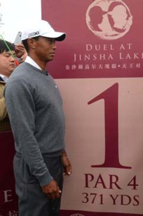 "This is certainly not like most Mondays" ... Tiger Woods, left.