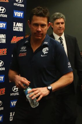Brett Ratten arrives for a press conference to announce his sacking.