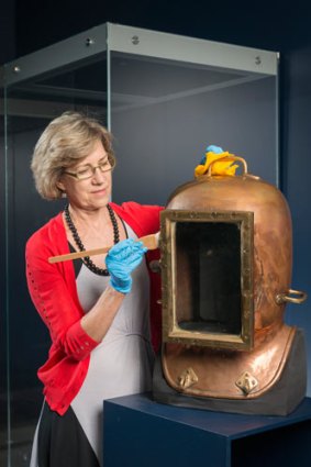 The Queensland Museum's <i>Deep Oceans</i> exhibit features artefacts from sea-faring days gone by, including early dive suits.