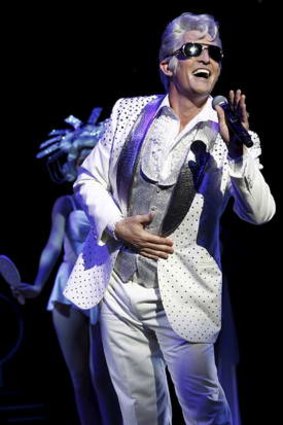 Todd McKenney as Teen Angel in <i>Grease</i>.