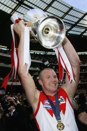 Barry Hall lifts the premiership cup after the Swans' 2005 grand final win over the Eagles.