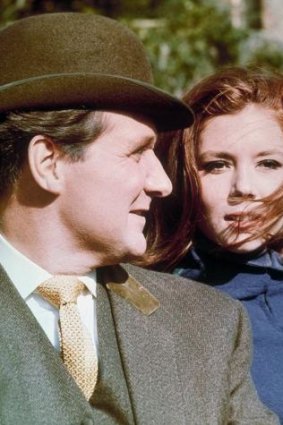 Patrick Macnee, left, as John Steed, and Diana Rigg as Emma Peel, British secret agents in a scene from The Avengers.