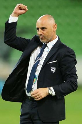 Victory coach Kevin Muscat celebrates after the final whistle.