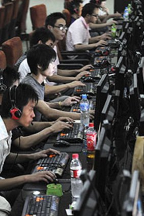 Netizens in action: Customers use computers at an internet cafe in Hefei, Anhui Province.