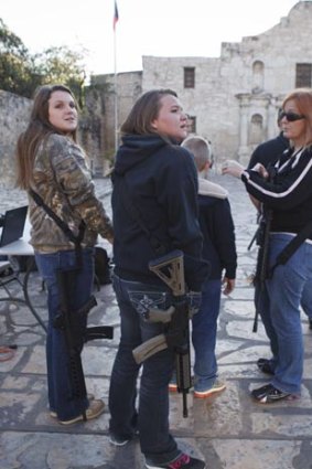 Teenagers carry weapons at the Alamo.