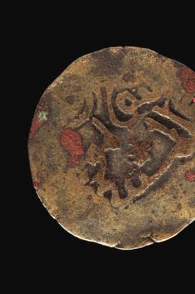 Coin of destiny … one of the copper alloy coins from East Africa's Kilwa Kisiwani sultanate that were found on Marchinbar Island.