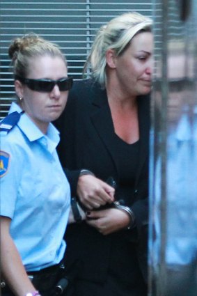 Keli Lane is led away from the NSW Supreme Court after her conviction for murder.