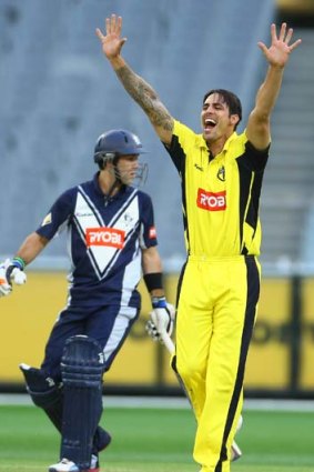 Mitchell Johnson appeals unsuccessfully for the wicket of Glenn Maxwell of the Bushrangers during the Ryobi Cup match at the MCG on Wednesday.