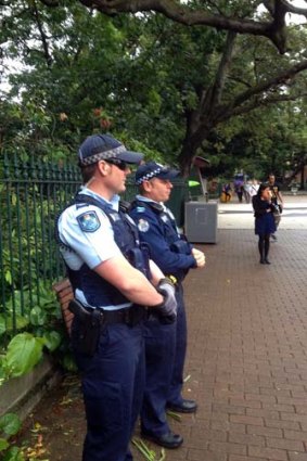 Police wait for an anti-Islam protest in Brisbane's CBD that failed to eventuate.