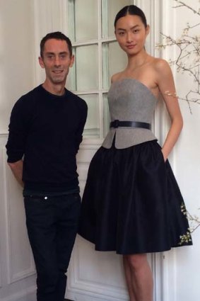 Martin Grant and a model wearing one of this season's designs.