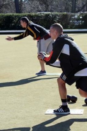 Waikato Chiefs flyhalf Aaron Cruden enjoys a game of lawn bowls at the ACT Rugby Union Club on Friday in the build-up to his side's Super Rugby qualifying final against the ACT Brumbies.