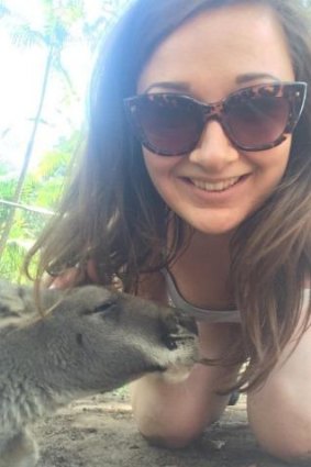 British backpacker Jade Fox with a kangaroo.