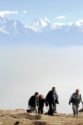 Sight for sore eyes … Ruit and three medical colleagues on the breathtaking two-day trek through the Himalayan foothills to Manpur.