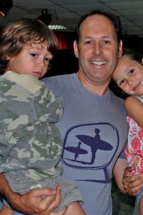 Matthew Joyce and his wife, Angela Higgins, with two of their children.