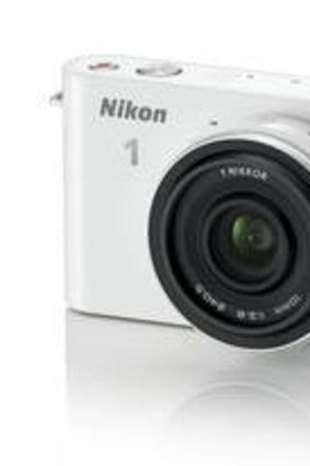 Nikon J1 with Lens.
