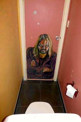 In situ: Ben Quilty's portrait of Warwick Thornton now adorns the back of the bathroom door.