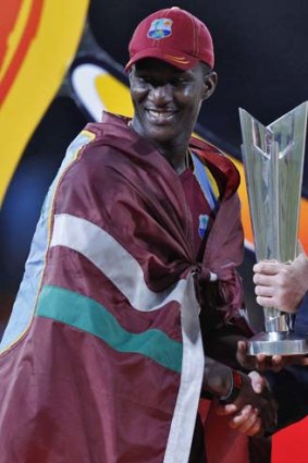 West Indies captain Darren Sammy with the trophy.