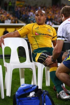 Will Genia is treated for an injury during the Rugby Championship match against South Africa.