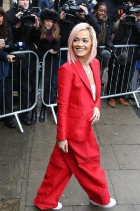 Singer Rita Ora leaves after recording of the Band Aid 30 charity single.