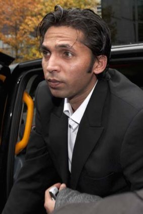 Pakistan cricketer Mohammad Asif arrives at Southwark Crown court for sentencing after being found guilty of conspiracy to cheat and of conspiring to accept corrupt payments.